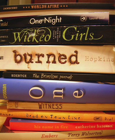 Spine Poem of Novels in Verse: Worlds Afire / One night, wicked girls / burned the Brimstone Journals. / One witness dead / on Town Line--his name in fire. Embers. (by Sarah Tregay)