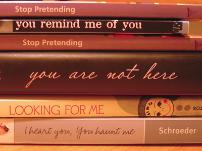 Spine Poem of Novels in Verse: Stop pretending / you remind me of you. / Stop pretending / you are not here looking for me. / I heart you, you haunt me. (by Sarah Tregay)