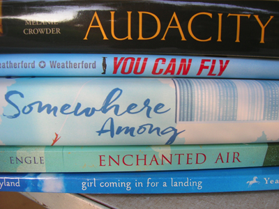 Spine Poem of Novels in Verse: Audacity, you can fly / somewhere among enchanted air / girl coming in for a landing. (by Sarah Tregay)